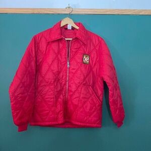 Vintage 1970s quilted jacket with embroidered patch